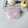 Detail of pink quilted heart mini pouch with snap pocket on a lifestyle desktop - Big Heart Pink