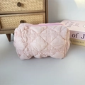 Soft quilted light pink cosmetic bag with diamond patterns and zipper closure - Quilted Diamond Pink