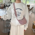 Pink nylon crossbody crescent bag shown on model for a trendy and casual everyday look - Taro Purple