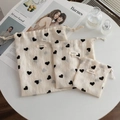 Three-piece set of cream drawstring storage bags featuring black heart prints - Small And Medium And Large