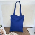 Close-up of royal blue canvas tote bag showing durable texture and minimalist design - Royal Blue (8oz)
