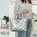 Quilted silver PU tote bag with elegant bow patterns and soft padded handle for daily use - Bowknot Silver