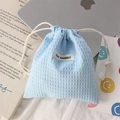 Detail of light blue waffle fabric drawstring bag for cosmetics and small accessories - Polyester Waffle Blue