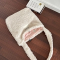 White faux shearling tote bag with SEEYOU label shown on dark wooden floor background - Double-Sided One Strap Crossbody / Beige Plush