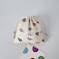 Macro detail of seersucker drawstring pouch featuring a cute cartoon elephant print - Cute Elephant