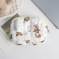 Detailed close-up of quilted floral pouch with bear pattern and snap front pocket - Cartoon Bear