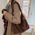 Brown large capacity woolen tote shoulder bag shown on model in khaki autumn trench coat - Brown