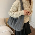 Grey wool tote bag with large capacity and letter label shown on model's shoulder - Gray