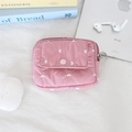Macro view of pink quilted floral earphone case with heart embroidery and snap pocket - Pink Diamond Lattice Heart