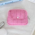 Detailed shot of pink quilted mini pouch with snap button pocket and silver ring zipper - Quilted Vertical Stripe Pink