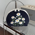 Detail of navy makeup bag with daisy embroidery and cute bear-shaped zipper pull - Daisy (Navy Blue)