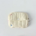 Close-up of quilted cream mini pouch with front snap pocket and floral embroidery detail - Cream Embroidered Small Heart