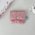 Pink quilted puffer AirPods case with snap closure and blue metal carabiner on white desk - Small / Pink (Glossy)