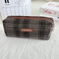 Detail of vintage brown plaid tweed pencil case with leather logo and metal zipper - Woolen Khaki Brown Plaid