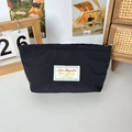 Detailansicht der schwarzen Kosmetiktasche aus Nylon mit Silberreißverschluss im Heimdekor - Schwarz