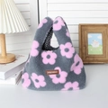 Detail view of plush bag with pink flower pattern and classic checkered lining - Plush Pink Flower
