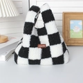 Detail view of plush black and white checkerboard tote bag with brown leather label logo - Black Checkerboard