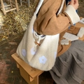 Off-white plush tote bag with purple floral embroidery and horn button closure - Beige
