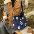 Navy blue plush tote bag with purple flower embroidery and a wooden toggle closure - Navy Blue