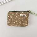 Flat lay of an olive green floral canvas pouch with pink patterns and a zipper closure - Green Floral
