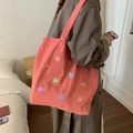 Coral pink canvas tote bag featuring intricate sea life embroidery and a spacious design - Coral Pink - Jellyfish & Shell Embroidery