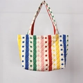 Detail of colorful striped quilted tote bag with floral patterns and a metal buckle - Colorful Stripes and Dots