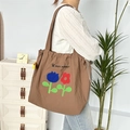 Detail of brown nylon drawstring tote bag with colorful tulip embroidery and brand logo - Double Color Flower Double Layer Shoulder / Brown
