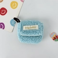 Close-up of soft sky blue plush earphone case with gold embroidered mayrabbit cloth label - Small / Light Blue