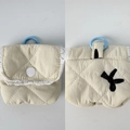Beige quilted floral earphone case with lace trim and blue clip in a variant view - Embroidered Beige Bow