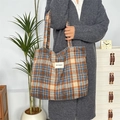 Classic plaid woolen tote bag shown in a cozy interior setting with large capacity - Woolen Blue Plaid