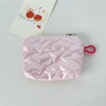 Detail of pink heart-quilted PU leather coin purse with zipper and metal glossy finish - Big Heart Pink