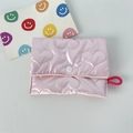 Detail of pink quilted heart coin purse with glossy nylon texture and snap closure - Big Heart Pink