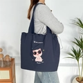 Large capacity navy blue tote bag with pink cartoon pig embroidery and drawstring closure - Navy Blue