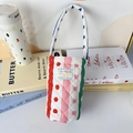 Detailed view of quilted colorful striped bottle bag with soft fabric and carry handle - Colorful Stripes and Dots