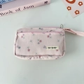 Detail of pink corduroy floral pencil case with zipper and May Rabbit brand label - Pink Corduroy Floral