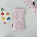Detail of pink glossy bow-embossed pencil case with soft quilted texture and blue button - Small Bow Pink