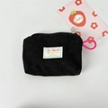 Top view of black corduroy cosmetic pouch with metal zipper and fuchsia lanyard strap - Black