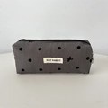 Detailed shot of dark gray corduroy makeup bag with black polka dots and zipper - Grey Bow Polka Dot Pencil Case