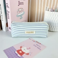 Close-up of pleated stripe stationery pouch featuring mayrabbit tag and metal zipper - Blue Purple Stripe
