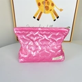 Detail view of pink quilted cosmetic bag with heart pattern and silver metal zipper - Large Heart Deep Pink
