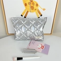 Detail of silver quilted PU cosmetic bag with metallic finish and zipper closure - Bubble Rhombus Silver