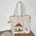 Beige canvas tote bag with mushroom house embroidery and grey drawstring closure - Mushroom House Embroidery / Beige
