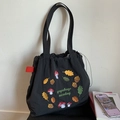Black nylon tote bag featuring forest mushroom embroidery and drawstring closure - Black