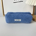 Detailed close-up of blue teddy fleece pencil case with MAY RABBIT label and sturdy zipper - Dark Blue