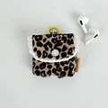 Close-up of leopard print corduroy earphone case with delicate white lace trim - Khaki Leopard