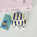 Close-up of blue and yellow striped earbud pouch with lace trim and wireless earphones - Blue Yellow Stripe