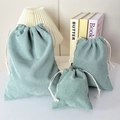 Three-piece set of mint green corduroy drawstring storage bags with textured fabric - Small / Grass Green
