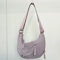 Detail of greyish-purple nylon crescent bag showing adjustable strap and woven rope zipper - Purple (Small)