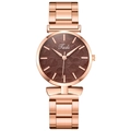 Detailed close-up of rose gold watch face with brown leaf texture and link strap - Brown