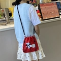 Large red canvas drawstring shoulder bag with white dalmatian patch and woven strap - Ribbon Puppy (Red)